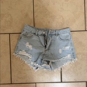 SHEIN Light Blue Ripped Jean Shorts